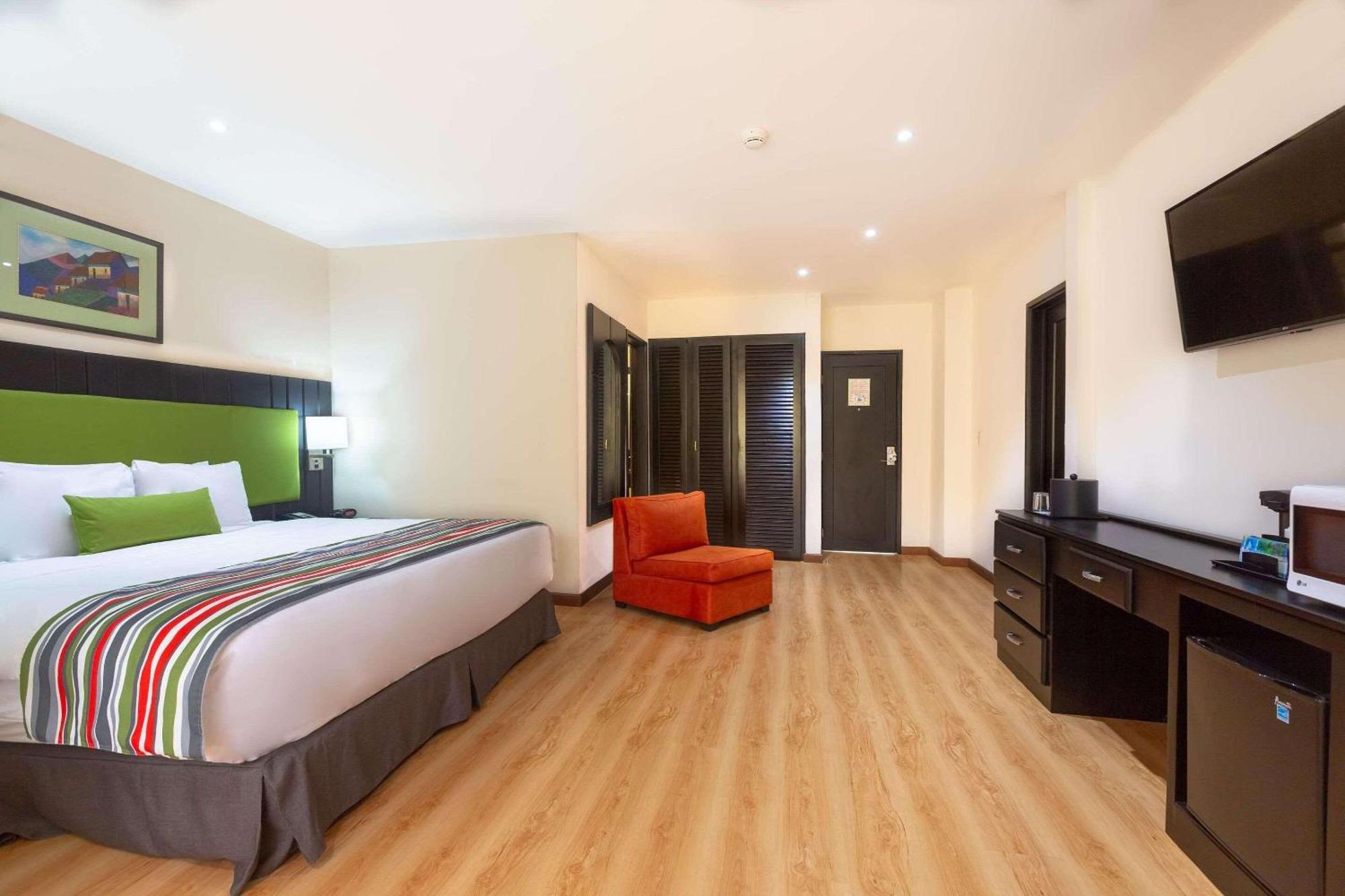 Country Inn & Suites By Radisson, San Jose Aeropuerto, Costa Rica Сан-Хосе,  Коста-Рика — бронируйте Отели, цены в 2024 году